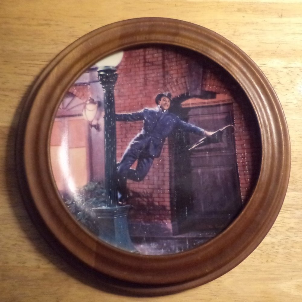 Framed Edwin Knowles singing in the rain plate.